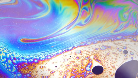 Dreamy background. Colorful fluid swirl creating bubbles
