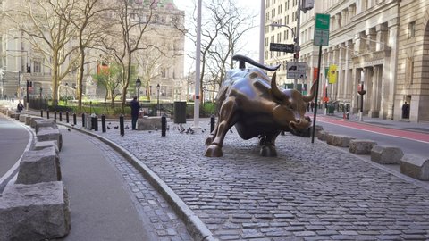 New York City, United States – 05/26/2020: Bull on Wall Street New York NYC Coronavirus Pandemic COVID-19 Shut Down Lock Down 4K
