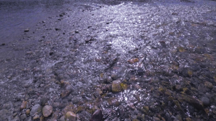 River Walk During Spring In Alberta Canada With Beautiful Skies, Focus Pulls and Slow Motion and Crisp Cold Flowing Water. 