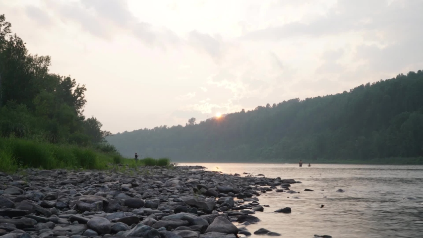 Timelapse summer sunset on the river
