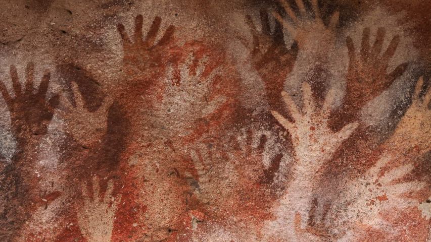 Prehistoric hand paintings at the Cave of Hands (Spanish: Cueva de Las Manos ) in Santa Cruz Province, Patagonia, Argentina. The art in the cave dates from 13,000 to 9,000 years ago. | Shutterstock HD Video #1049307061
