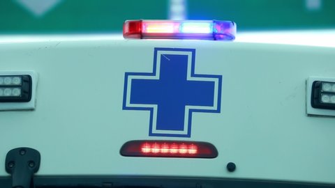 Close up Emergency ambulance flashes night