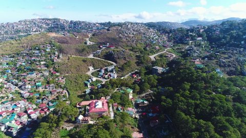 Pull Out Aerial Shot Of Houses On Top Of Mountains In Baguio Philippines