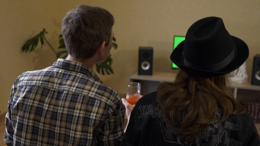 4K 60p Two Funny Guys Shaking Heads. Friends Having fun Listening to Music Sitting in Couch Sofa. Watching Green Screen TV