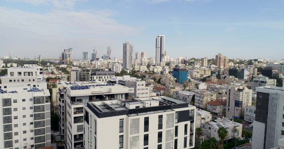 Aerial view of Tel aviv skyline. Urban landscape at daytime with skyscraper view and Sea water in horizon 