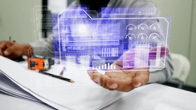 Engineer looking parameter and data on hologram screen, Technology and futuristic concept - Powered by Shutterstock - Get 15% off with code: PIKWIZARD15