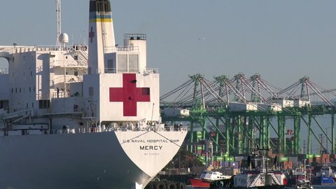 SAN PEDRO, CALIFORNIA USA: March 27, 2020. The U.S Navy’s hospital ship USNS Mercy arriving at the Port of Los Angeles with 1000 hospital beds for non Coronavirus COVID-19 patients during the pandemic