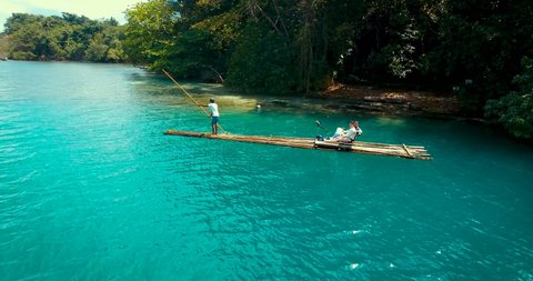  Jamaican Bamboo Rafting , blue water, beach 