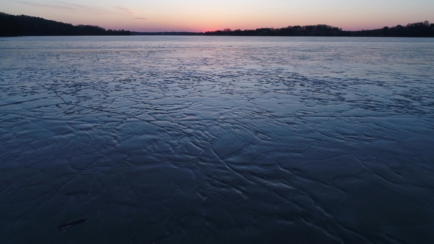 beautiful sunset over the frozen lake