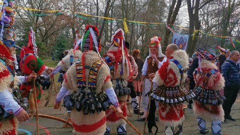 Yambol,Bulgaria-February-28-2020:International masquerade games Kukerlandia in Yambol Bulgaria.People with traditional carnaval costumes of Kukeri Festival.