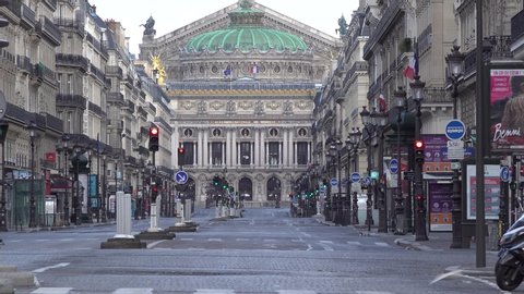 PARIS, FRANCE - March 29th 2020 : 
The Palais Garnier, the opera house of Paris sighted from Opera avenue completely empty during the period of containment measures due to the Covid-19 Coronavirus.