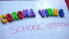 Europe, Asia and America ( USA )  close schools and universities due to n-cov19 epidemic - child writes on magnetic board with colored letters 