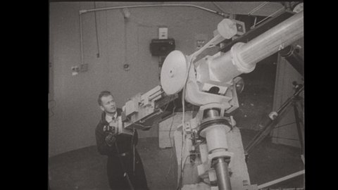 1950's Scientist with Special Motion Picture Camera Photograph's a Sun Flare. 4K Scan of Vintage 16mm Film 