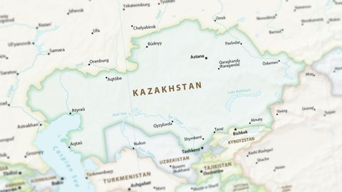 Kazakhstan region on a political map of the world. Video defocuses showing and hiding the map (4K UHD).
