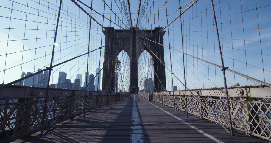 Brooklyn Bridge in New York City on a clear day with no foot traffic and Manhattan skyline in the background. Royalty-Free Stock Footage #1049482327