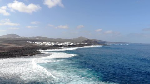 Aerial view of La Santa beach with ocean waves in Lanzarote, Canary islands