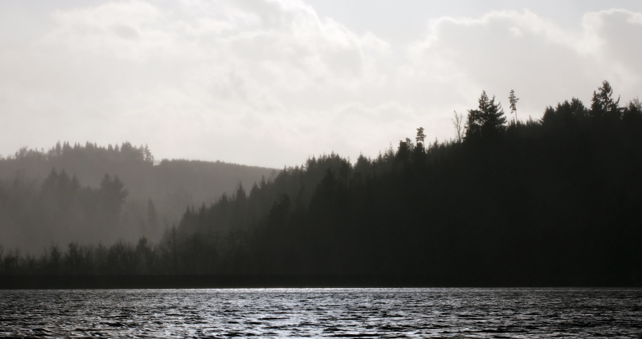 Lake and stormy sky, Auvergne, France.
