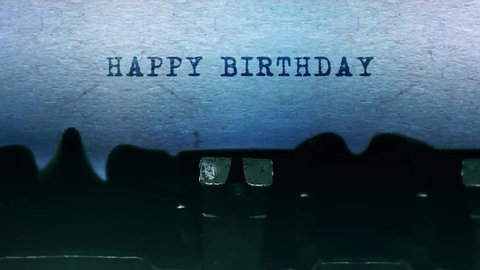 Happy Birthday Word closeup Being Typing and Centered on a Sheet of paper on old vintage Typewriter mechanical 4k Footage Background Animation.
