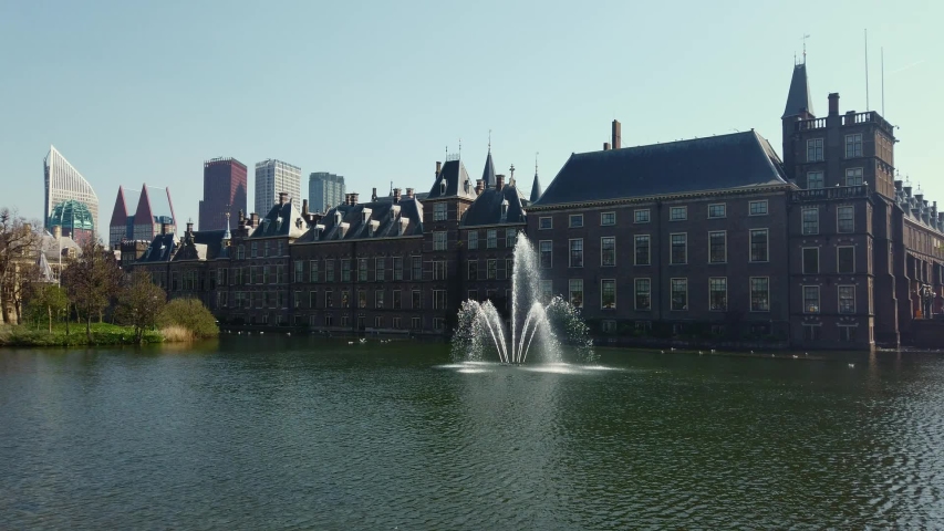 Fountain in historical center of The Hague, Holland. Modern buildings in background