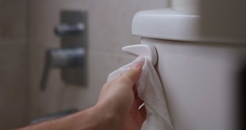 Cleaning Toilet Flush Handle with Anti Bacterial Wipe