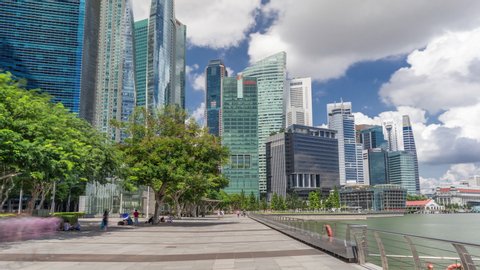 Business Financial Downtown City and Skyscrapers Tower Building at Marina Bay timelapse hyperlapse, Singapore, Cityscape Urban Landmark and Business Finance District Center