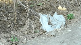 flying debris by nature, carelessly throwing plastic bags. Indestructible debris flies by nature. Environmental pollution