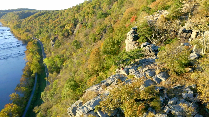 Couple Sitting on Cliff Above Harpers Ferry, West Virginia, Aerial View