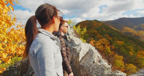 Two Hikers on Top of Seneca Rocks, West Virginia Landscape View