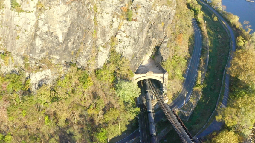 Aerial View Above Trains Entering Tunnel in Harpers Ferry, West Virginia