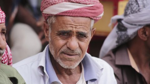 Taiz  Yemen - 16 Nov 2017: A Yemeni sheikh suffers from the cold and appears to be a touch of suffering and poverty