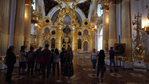 SAINT PETERSBURG, RUSSIA - JUNE 18, 2019:  Visitors inside Hermitage museum, Winter Palace, Saint Petersburg. Historic art & culture tourism, family travel destination in Russia.