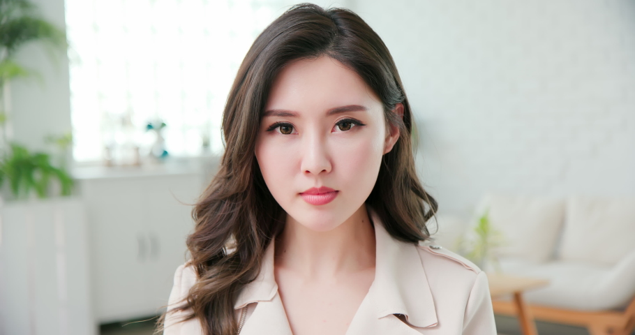 Emotion detected by artificial intelligence AI system concept - Young asian businesswoman makes some facial expressions on her face | Shutterstock HD Video #1049634550