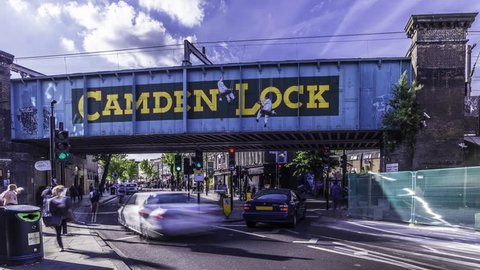 LONDON, UNITED KINGDOM - MAY 16, 2015 Timelapse view of the railway bridge next to the entrance of the famous street market Camden Lock in Camden Town, London