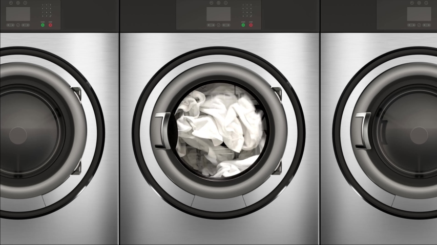 4K seamless slow motion animation of a commercial dryer full of bright white clean towels