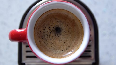 Top view of a cup of coffee with zoom. 4K