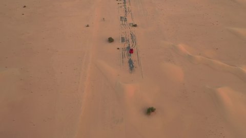 Super car in the Arabian desert road