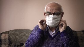 Elderly Turkish man wearing mask for protection from corona virus - Powered by Shutterstock - Get 15% off with code: PIKWIZARD15