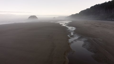 Morning Mist on Cannon Beach, Oregon. Early morning on the Oregon coast means mist or fog that makes for unique images of beach life. This short video shows just that at low tide.