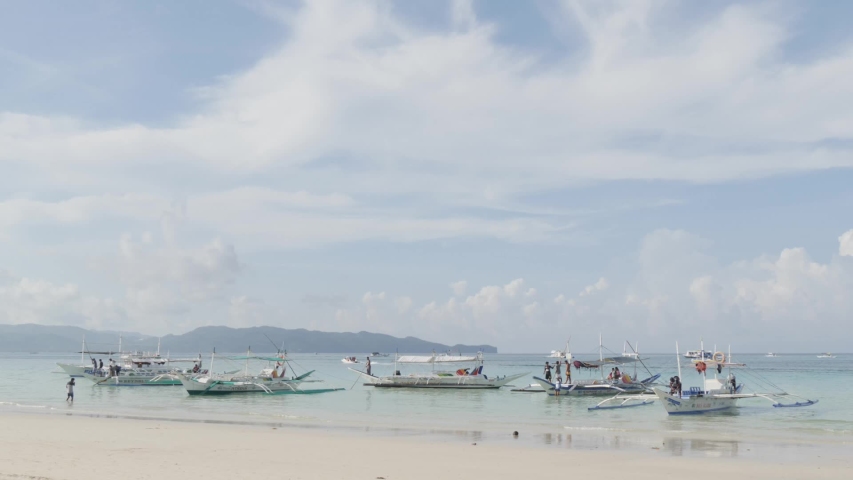 Boracay Island, locals and boats landscape Philippines