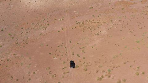 aerial view of the outgoing car in the desert lake is located in turkey