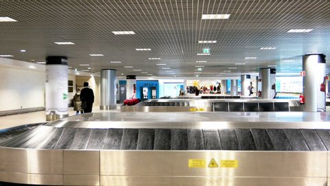 A baggage reclaim area of a large European airport lies almost empty after the COVID-19 pandemic caused massive travel disruptions