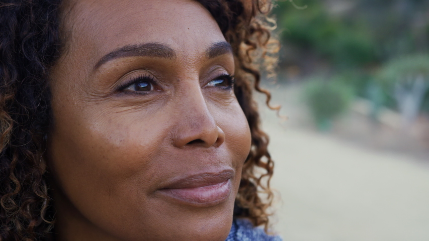 Close up of senior woman outdoors in countryside with smiling expression - shot in slow motion | Shutterstock HD Video #1049872531