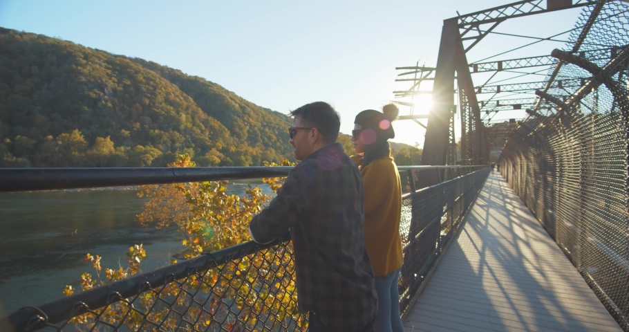 Couple Walking Train Bridge in Harpers Ferry National Historical Park