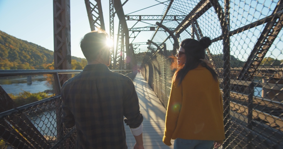 Couple Walking Train Bridge in Harpers Ferry National Historical Park