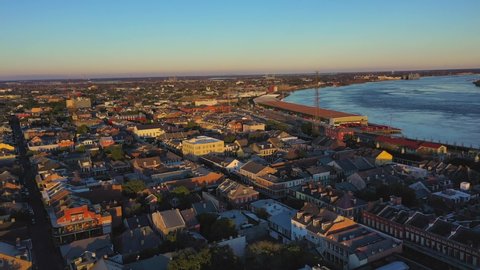 Aerial video of the French Quarter on New Orleans at Sunset with a view of the Mississippi River