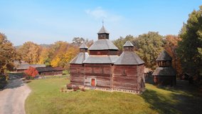 Wood structure of Old Church. a work of traditional. Ukrainian architecture. stands in a rural village. UltraHD 4k footage