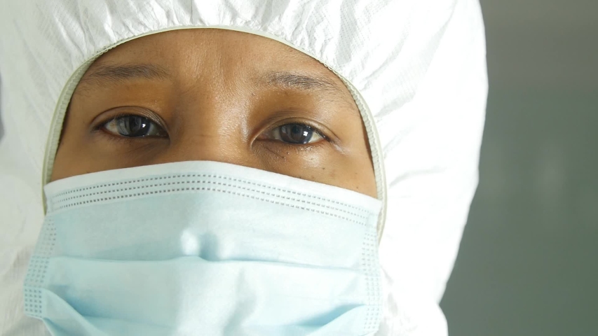 Healthcare worker in protective gear | Shutterstock HD Video #1049924941