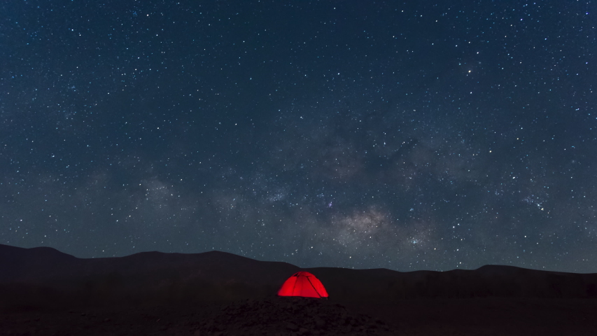 Red tent under Milky Way Galaxy Time Lapse Lampang Thailand, Universe galaxy milky way time lapse, dark milky way, galaxy view, star lines, timelapse night sky stars on sky background. 4K Resolution. | Shutterstock HD Video #1049926549