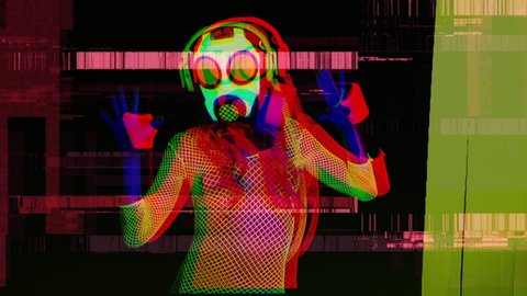 beautiful and strange disco gogo dancer with gasmask for protection from viruses filmed under UV light