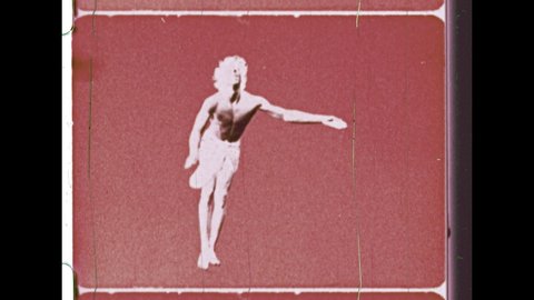 1970's. A Man in Loincloth does Acrobatic Flips on Psychedelic Horizon. 4K Overscan of 16mm Film Showing Frame Lines and Sprocket Holes 